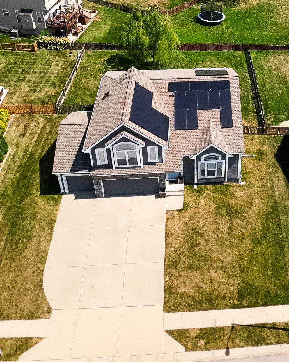 Aerial view of a Kansas City home with a Shinnova rooftop solar installation